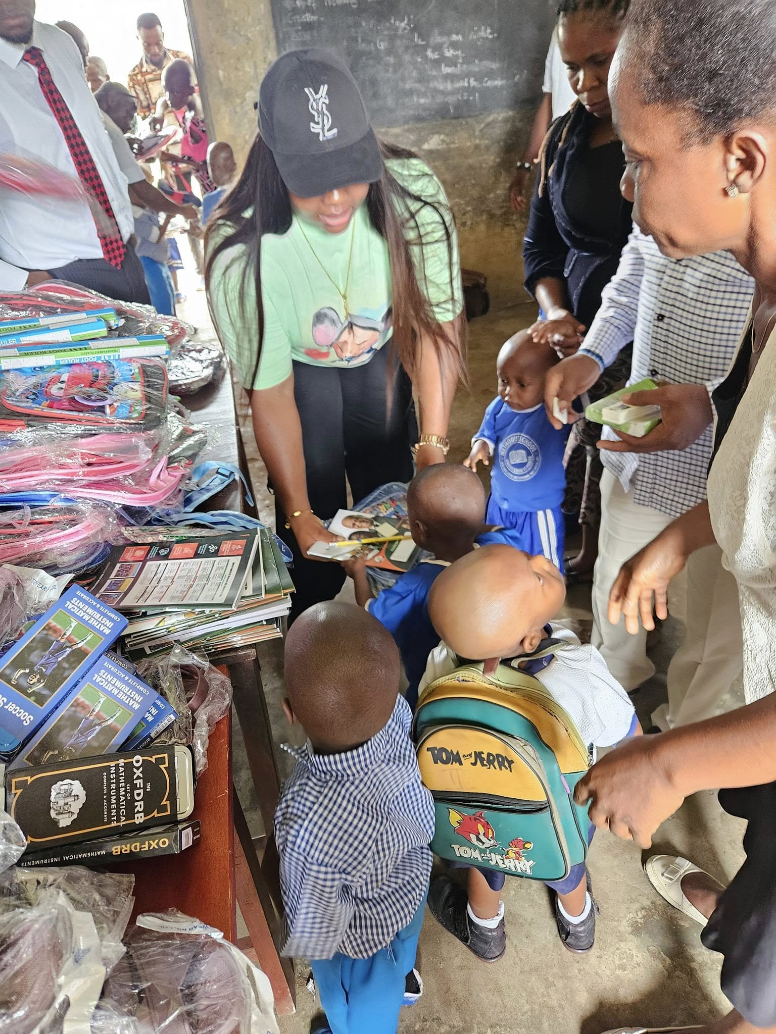 Children receiving educational materials during the initiative